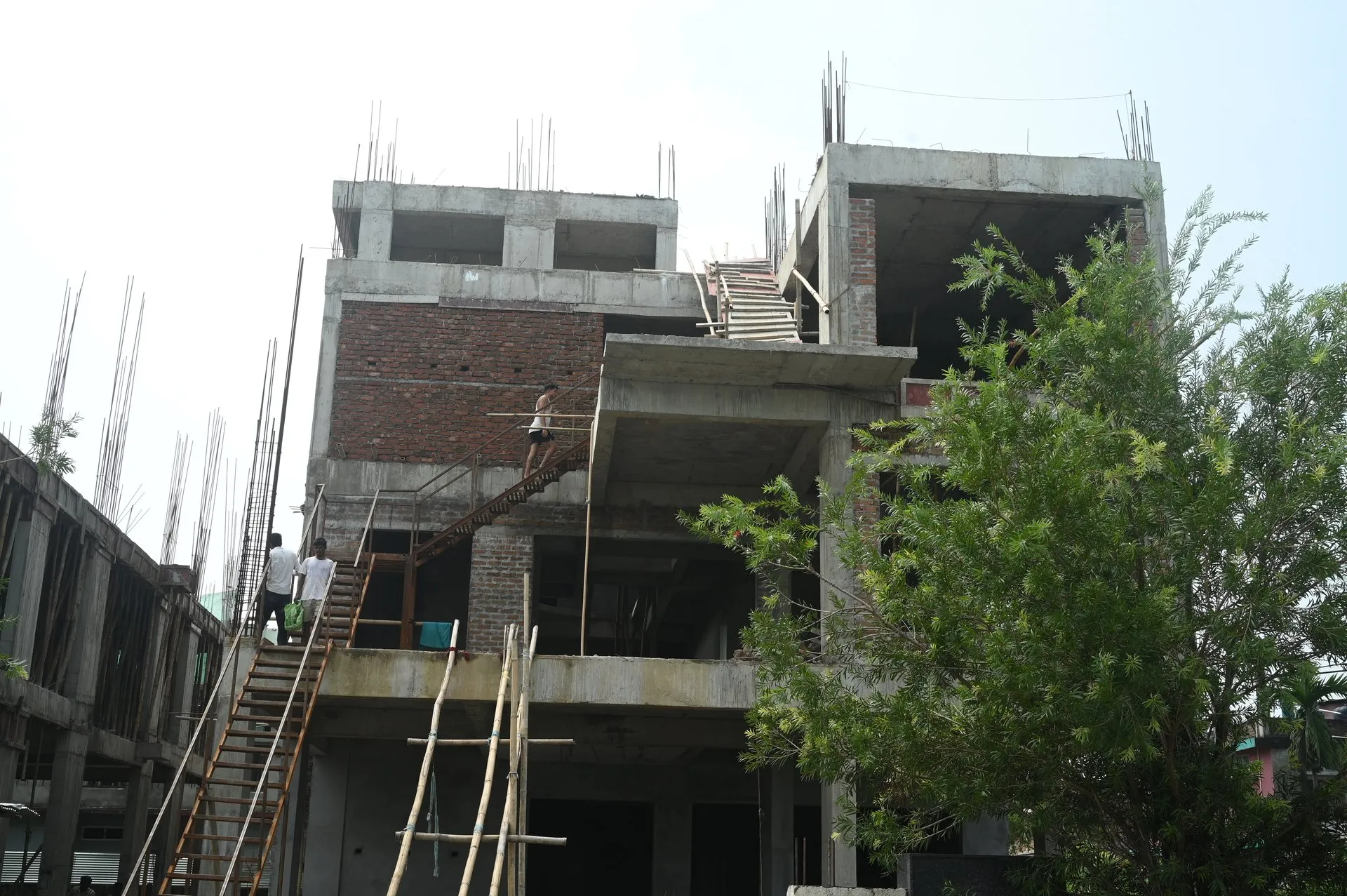 Structural columns, scaffolding, and masonry infill